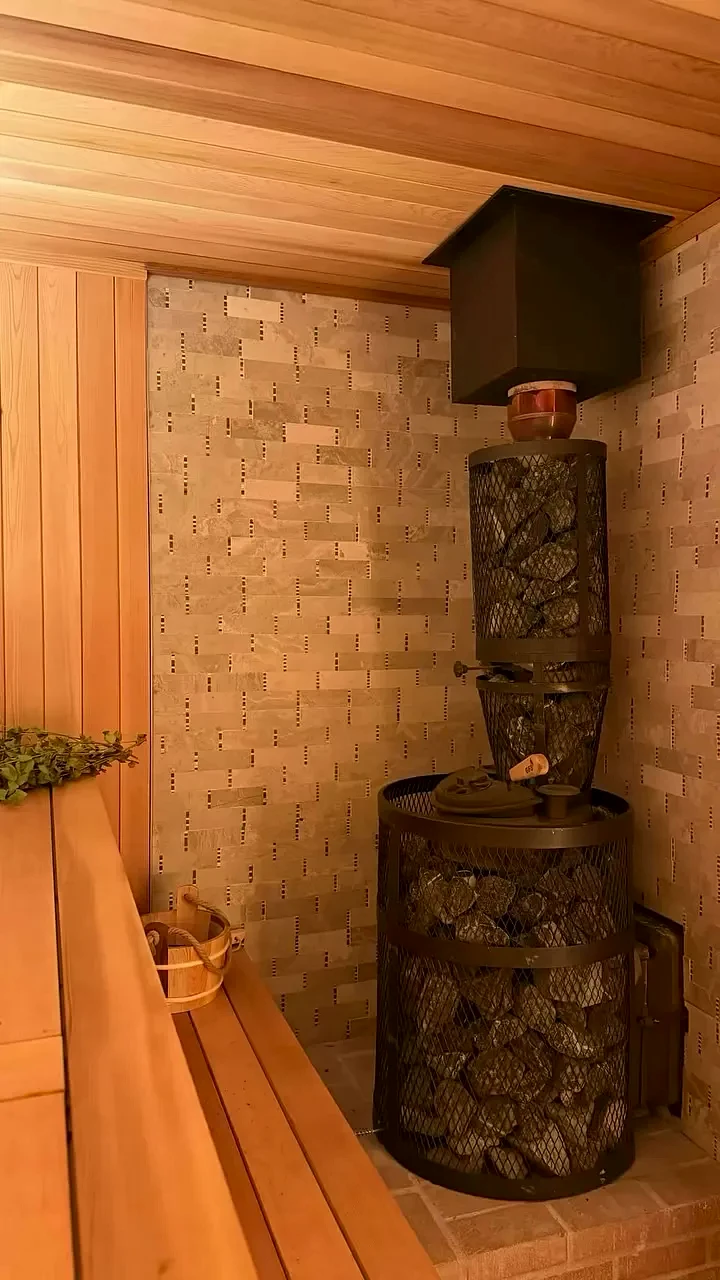The wood stove stacked with stones